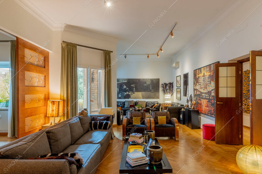 Zona living dell'appartamento Yalu, location in stile contemporaneo a Roma