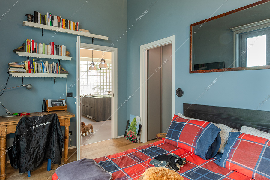Camera da letto del loft in stile eclettico Maqui, location per shooting a Milano