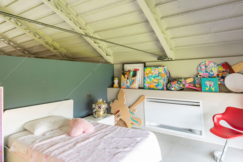 Camera da letto del loft Danubio, location in stile contemporaneo a Brescia