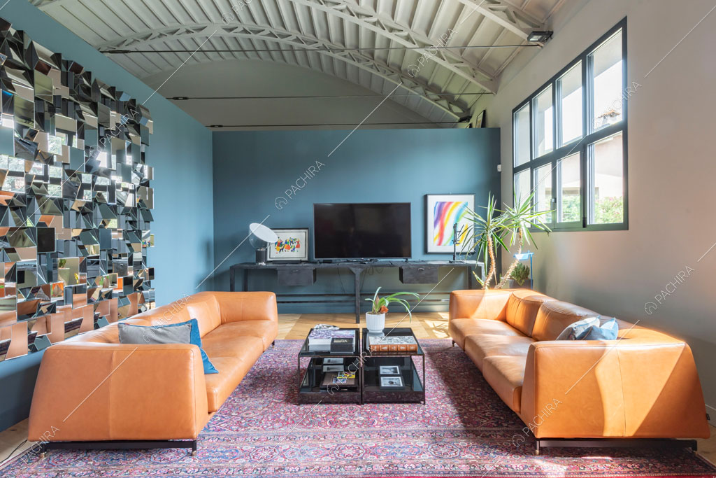Salotto del loft Danubio, location in stile contemporaneo a Brescia
