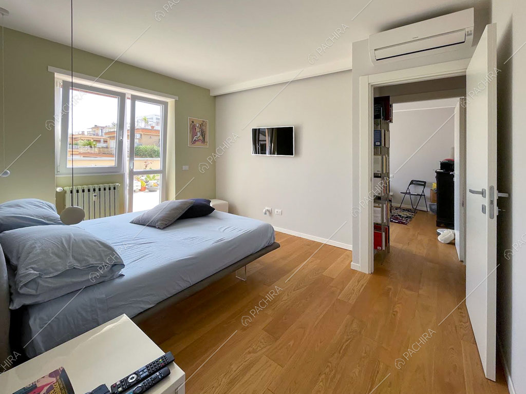 Camera da letto dell'appartamento Terfezia, location in stile contemporaneo a Roma