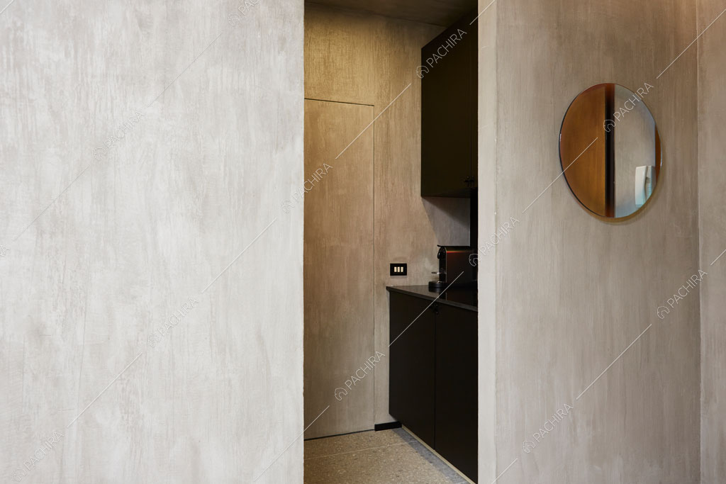 Cucina nera dell'ufficio Olmaria, location in stile contemporaneo a Milano