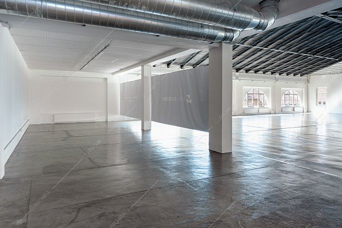 Open space di Annapurna, spazio espositivo in stile industriale a Lecco