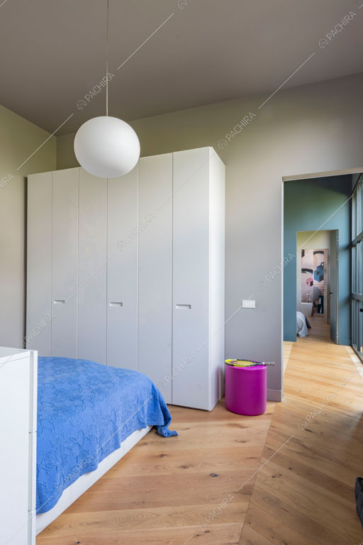 Camera da letto del loft Danubio, location in stile contemporaneo a Brescia
