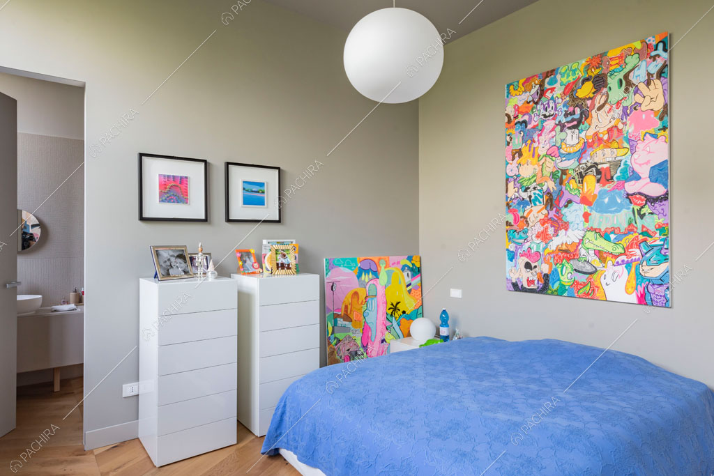 Camera da letto del loft Danubio, location in stile contemporaneo a Brescia