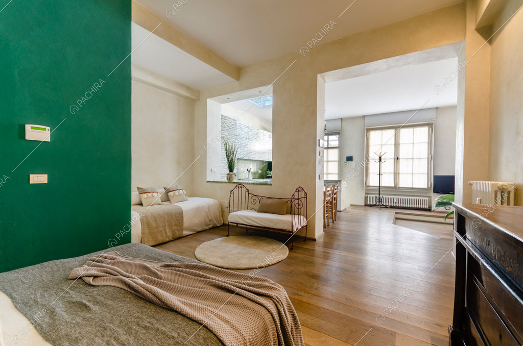 Camera da letto dell'appartamento Agrellite, location in stile moderno a Milano