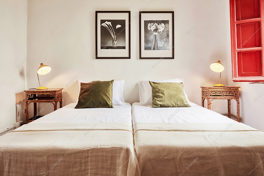 Camera da letto della masseria Mincio, location in stile rustico a Lucca