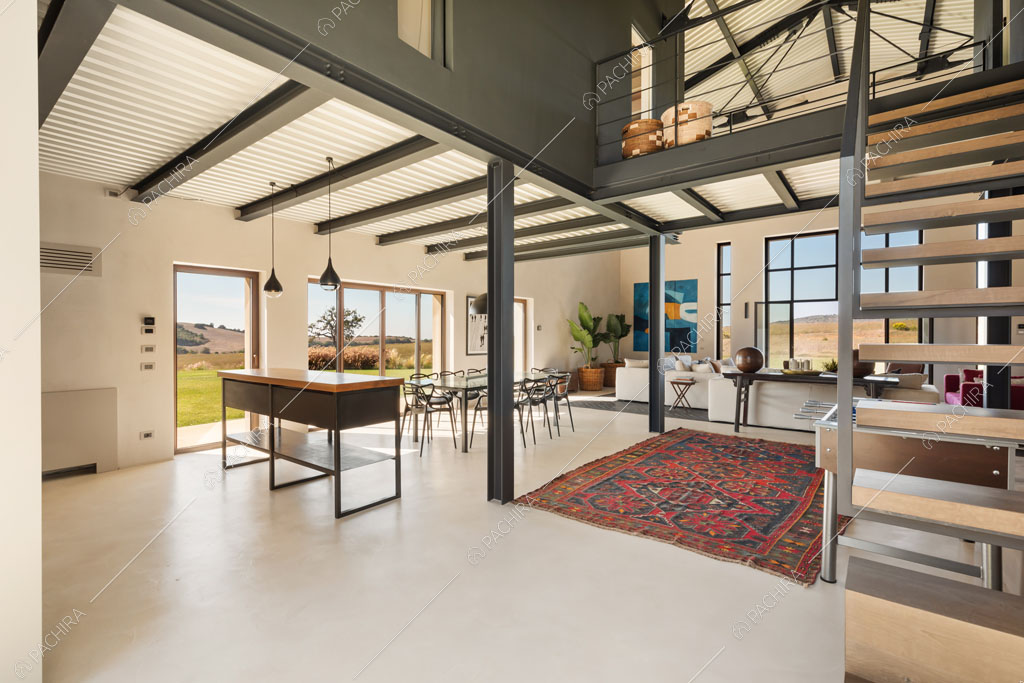 Zona living della villa Gypsum, location in stile moderno a Grosseto