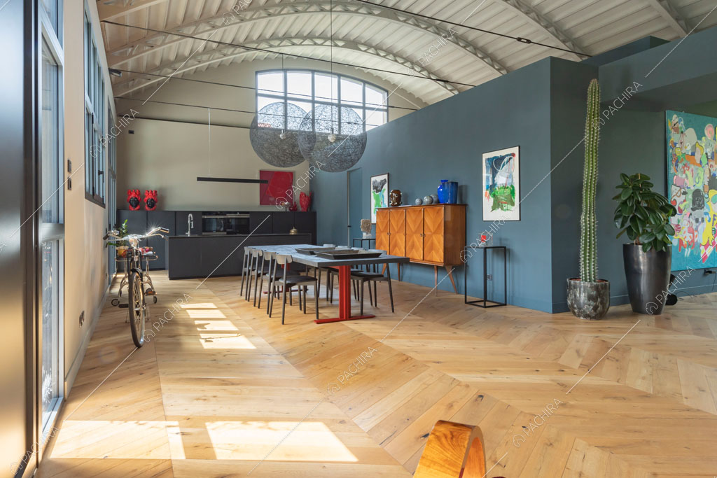 Cucina a vista del loft Danubio, location in stile contemporaneo a Brescia